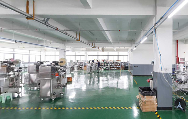 Assembly line for liquid packing equipment